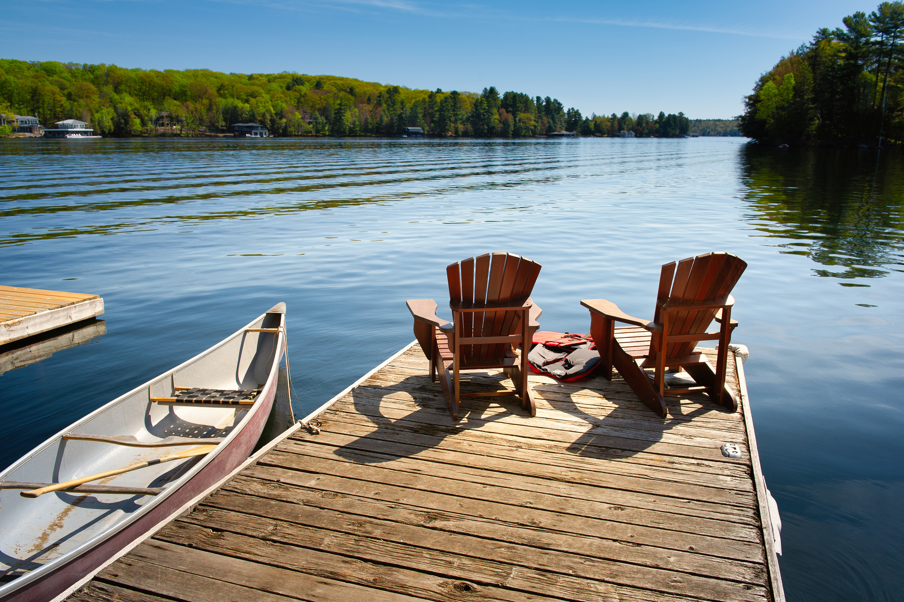 Dock with kayaks and chairs